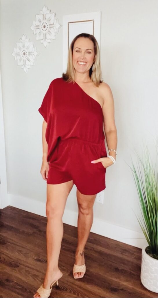 woman wearing red batwing romper for Amazon Summer Style Roundup 