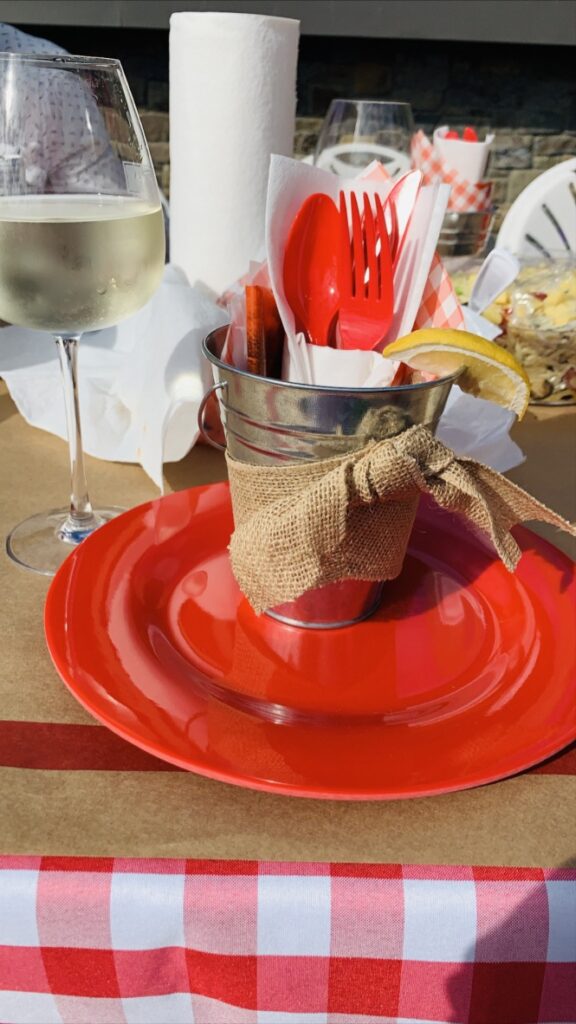 bucket utensils holder and red plate