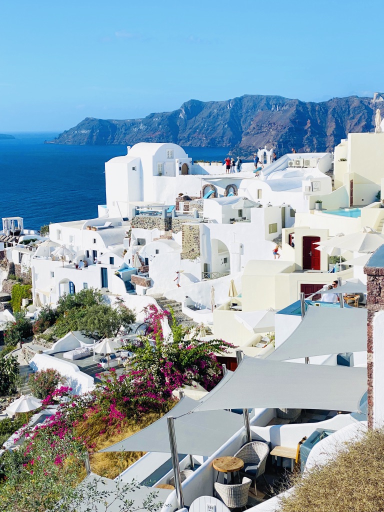walk the streets of Oia in Greece