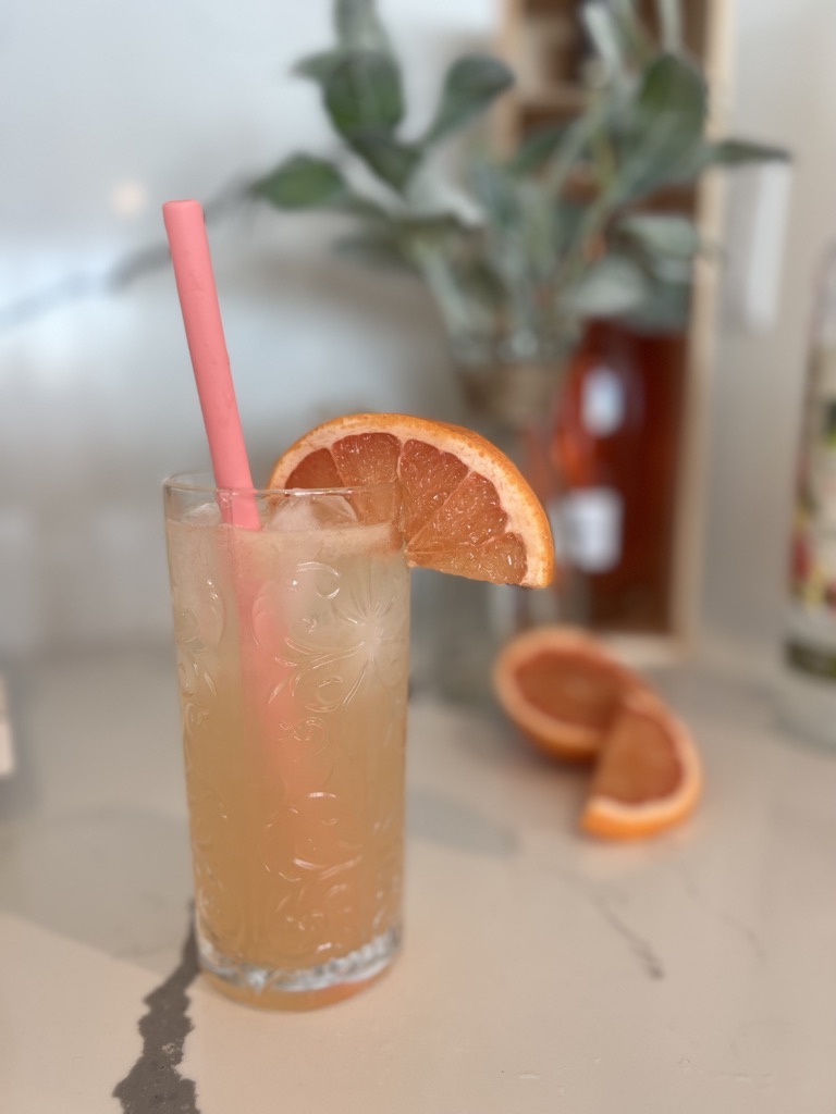 Grapefruit Vodka Fizz in a glass with straw