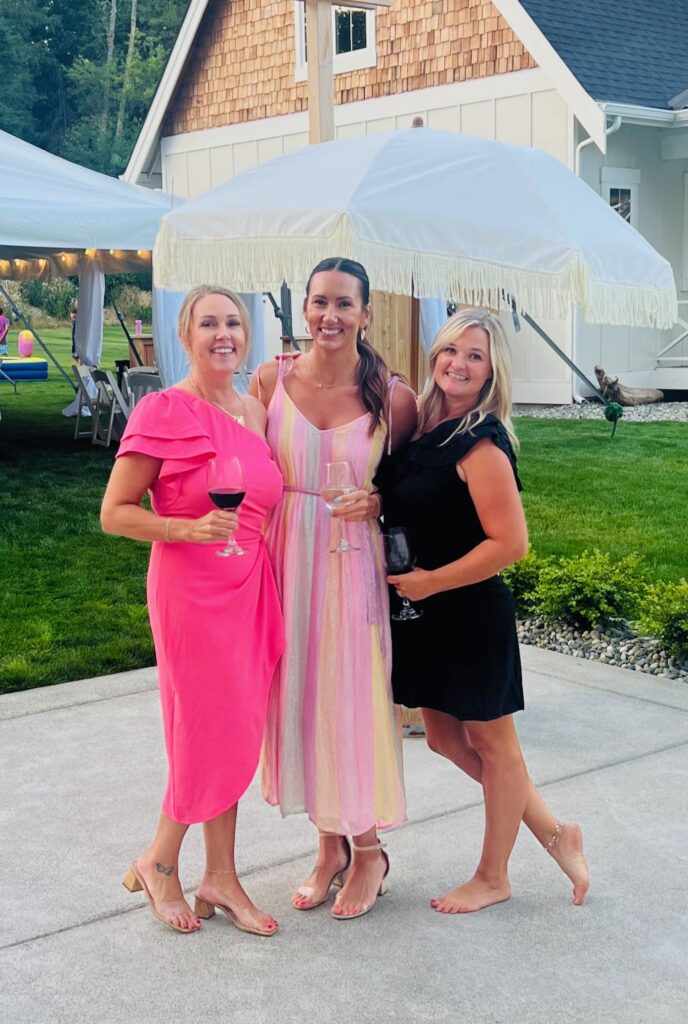 three women with her friends in a wedding 